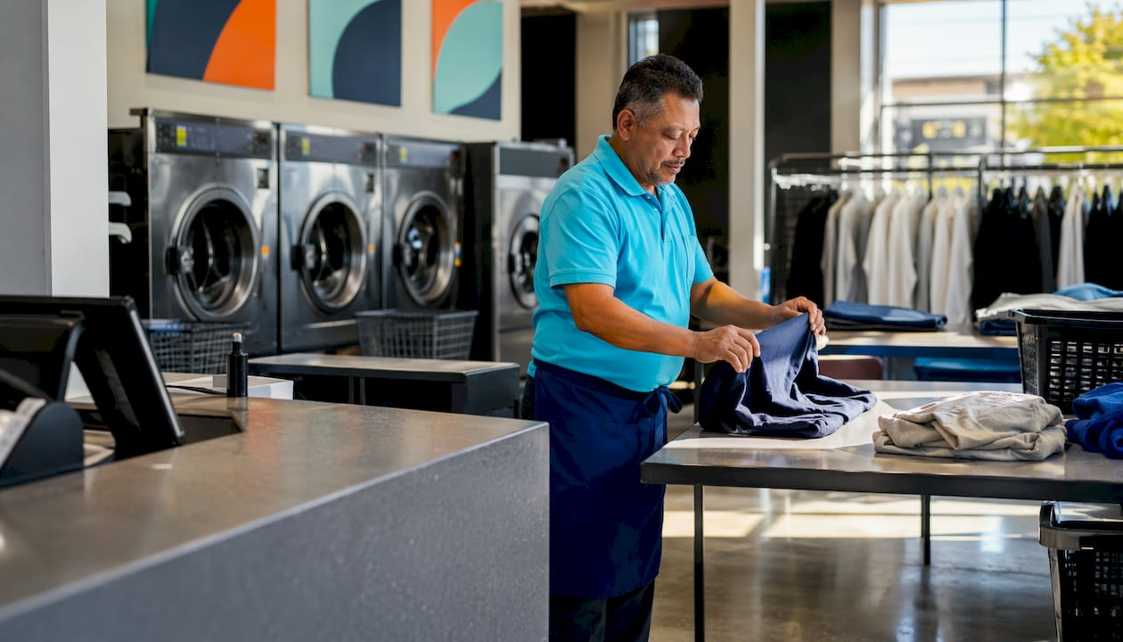 Laundry shop workflow zones and folding area