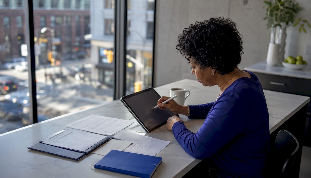 Entrepreneur registering Square account at home desk